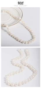 Detail of 925 silver freshwater pearl necklace showing uniform luster and manual knots