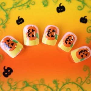Halloween pumpkin press-on nails with classic French medium square shape in orange