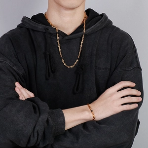 Street style gold lip chain necklace and bracelet set for men in minimalist titanium steel