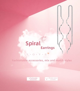 Macro detail of elegant S925 sterling silver spiral threader earrings with wavy design
