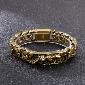 Detailed relief of a tiger head on a retro gold 316L stainless steel men's bracelet