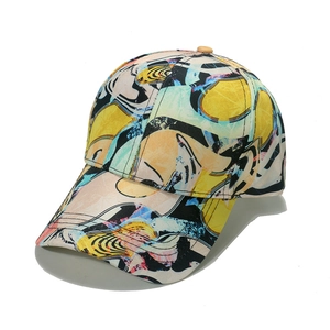 Detail view of the colorful abstract graffiti print on the canvas baseball cap fabric