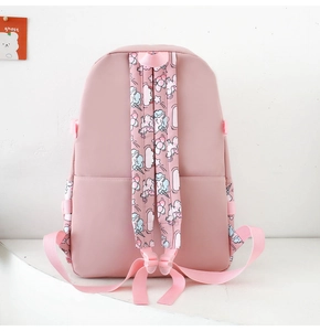 Rear view of pink nylon backpack showing adjustable straps with unicorn and cloud patterns