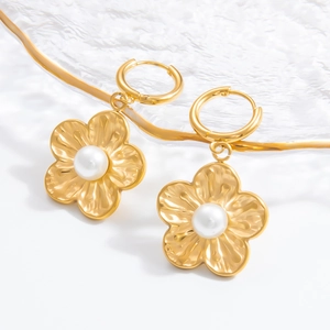 Elegant gold flower pearl earrings with brushed metal texture and ring clasp closure