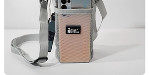 Detail of grey mesh crossbody bottle carrier with adjustable strap and brand logo