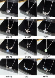 Detailed selection of titanium steel butterfly and heart pendant necklaces with crystals