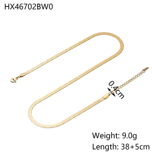 Detail of 0.4cm wide golden snake chain necklace with lobster clasp and extension link