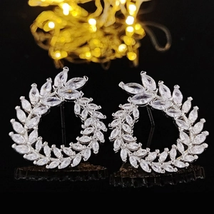 Elegant silver leaf earrings with marquise-cut clear cubic zirconia in a wreath shape