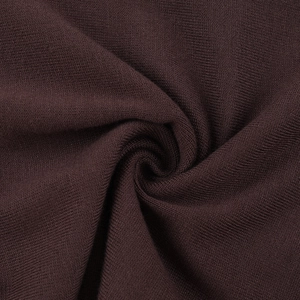 Detailed macro view of dark red rib-knit fabric texture with soft drape effect