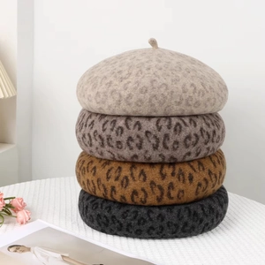 Chic leopard print wool beret hats for women shown in four stylish color variants