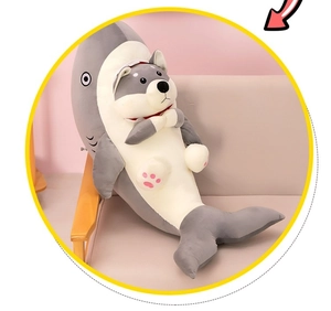 Detail of shark dog plush toy with shiba inu character in shark costume inside yellow frame