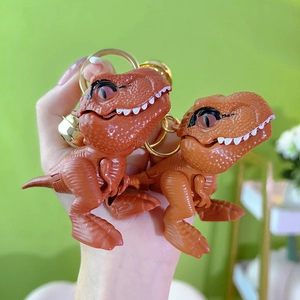Creative brick red Tyrannosaurus Rex keychain with golden bell and metal ring for backpacks