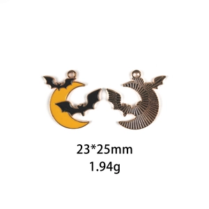 Detail of moon and bat alloy charm showing dimensions 23x25mm and weight 1.94g
