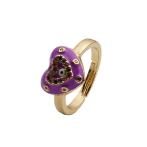 Detailed macro view of purple enamel heart ring with evil eye zircon on gold open band