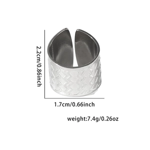 Detailed view of silver titanium steel ring with wave texture and size measurements