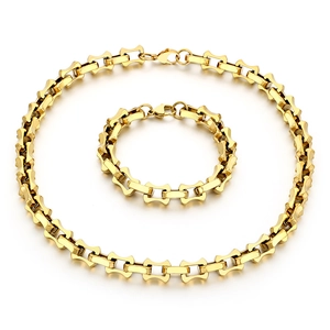 Golden H-link bamboo style stainless steel necklace and bracelet set on white background