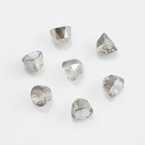 Macro shot of 8mm transparent faceted crystal glass beads with center holes for DIY