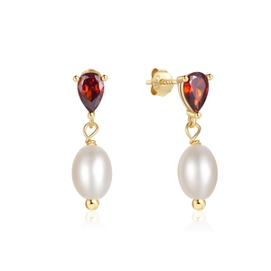 Close-up of S925 silver earring featuring red teardrop gem and elegant white pearl drop