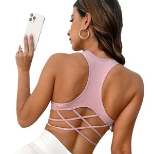 Pink high-impact yoga sports bra with cross-back straps shown from a back view