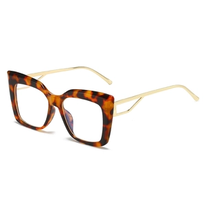 Cat eye blue light blocking glasses with tortoiseshell frames and gold metal temples