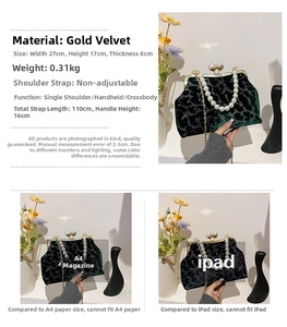 Detail of dark green velvet shell bag with pearl handle and metal chain strap