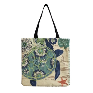Minimalist canvas tote bag with sea turtle print and vintage wood pattern background