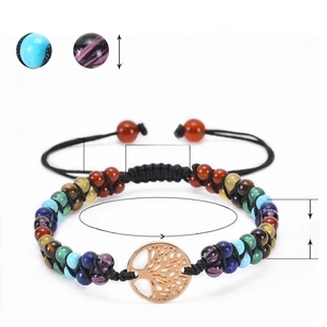 Handmade double-layered woven bracelet with natural gemstones and golden Tree of Life charm