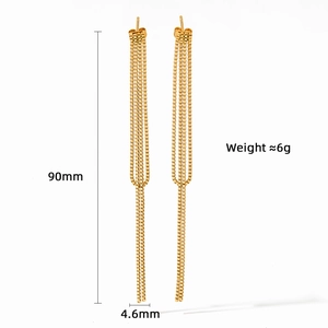 Detail view of 90mm long gold tassel earrings in stainless steel with measurement markings
