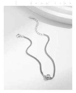 Detail of S925 sterling silver bubble chain bracelet with a sparkling round zircon stone