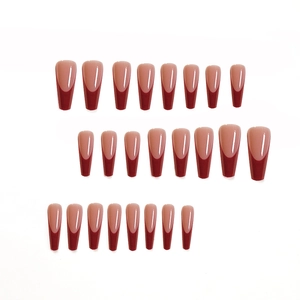 Long coffin french tip press-on nails with deep red edges and glossy nude finish