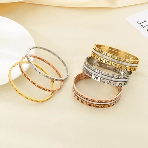 Chic Roman numeral bangle set with crystals in gold, silver, and rose gold finishes
