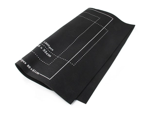 Détail du tapis de puzzle en feutre noir avec lignes de mesure pour 1000 et 1500 pièces