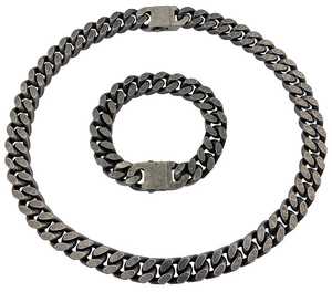 Detail of vintage gray stainless steel Cuban link necklace and bracelet set with secure clasp