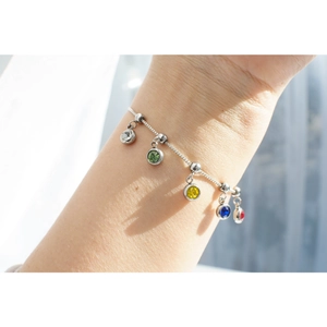 Silver stainless steel birthstone charm bracelet with colorful crystal pendants