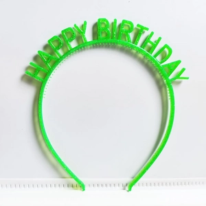 Detail of green plastic Happy Birthday headband with sparkling glitter for parties