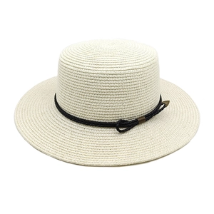 White wide-brim straw sun hat with black woven band and metallic accents for summer