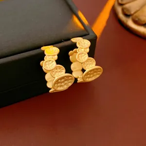 Minimalist gold-plated irregular C-shaped earrings with hammered coin texture design