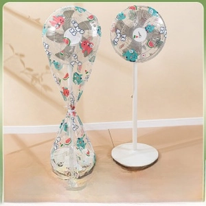 Detail showing two PEVA fan dust covers with cute dinosaur and watermelon patterns