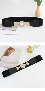 Close-up of black elastic belt featuring a golden metal buckle with crystal inlay detail
