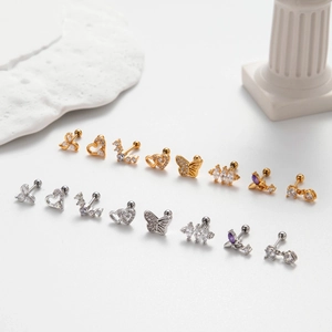 Macro shot of stainless steel stud earrings with zircons and screw backings