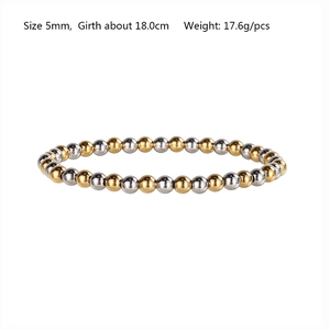 Detail view of 5mm gold and silver stainless steel beads with 18cm elastic girth