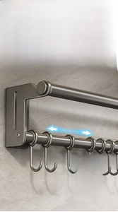 Detail of kitchen wall rack showing sliding solid hooks with silent silicone pads