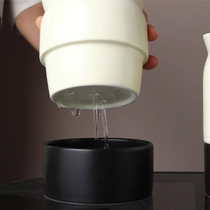 Nordic ceramic chopstick holder set in cream and black with efficient drainage system