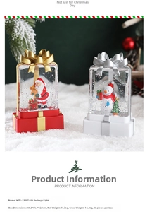 Close-up of LED Christmas gift box lanterns featuring Santa and snowman in snow scene