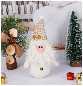 Detailed view of Christmas gnome figurine with sequined hat on a festive holiday table