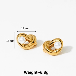 Detailed view of gold knot heart earrings with pearl inlay and size specifications