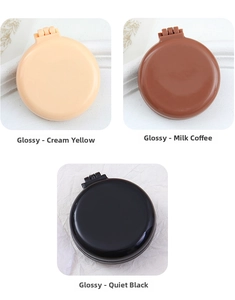 Three glossy foldable hairbrushes in cream yellow, milk coffee and black with mirror