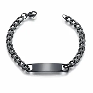 Macro view of black titanium steel Cuban link bracelet with rectangle blank ID tag