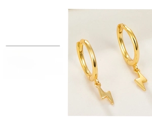 Detail of lightning bolt hoop earring featuring thick 18K gold plating for lasting shine