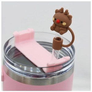 Reindeer silicone straw cover cap for Christmas party decor on pink tumbler glass straw